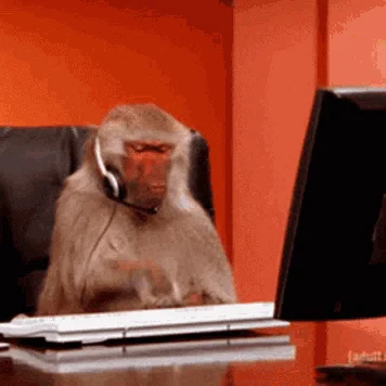 Uday's GitHub avatar — a baboon in a headset, working at a computer